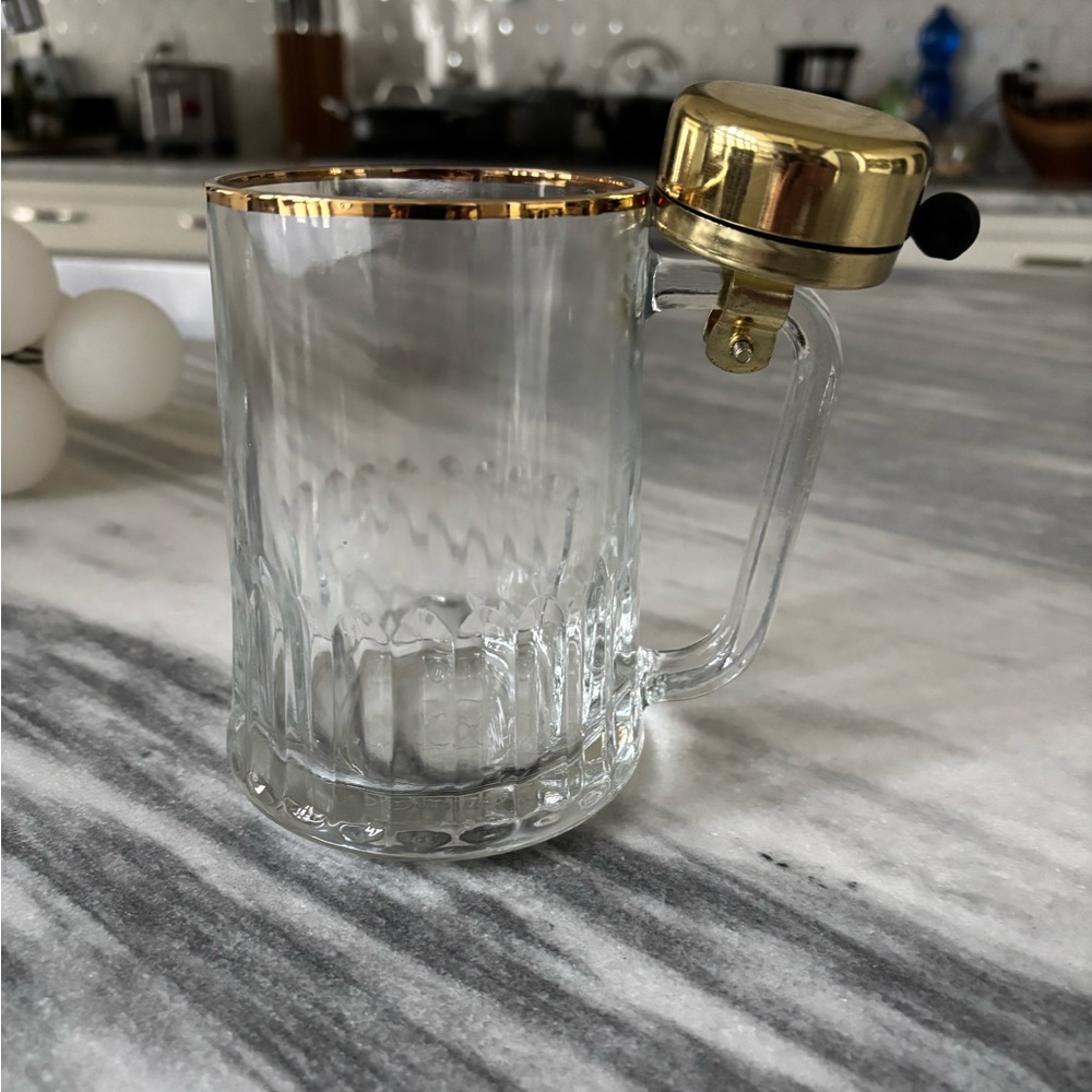 Tudor Dema made in England beer mug with gold toned bell ringer 
Collectable